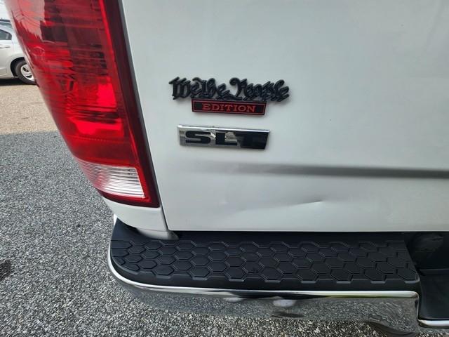 RAM 1500 4WD Quad Cab 140.5" SLT 2016