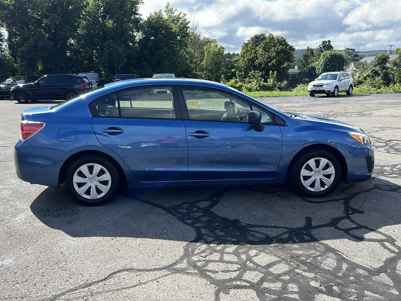 Subaru Impreza Sedan 4dr Man 2.0i 2014