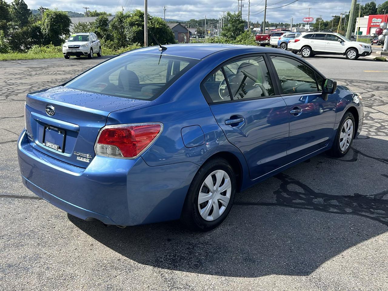 Subaru Impreza Sedan 4dr Man 2.0i 2014