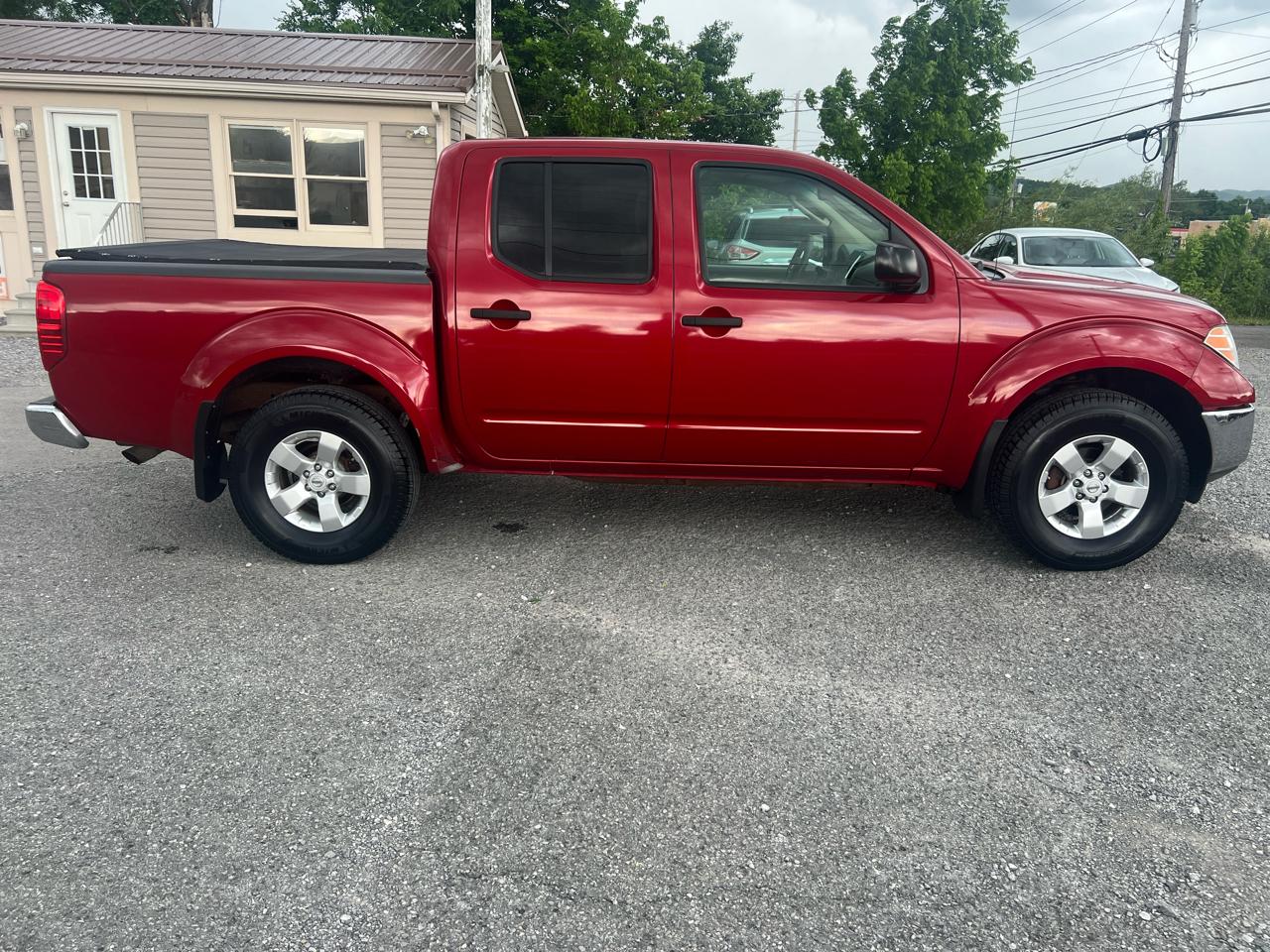 Nissan Frontier 4WD Crew Cab SWB Auto SE 2009