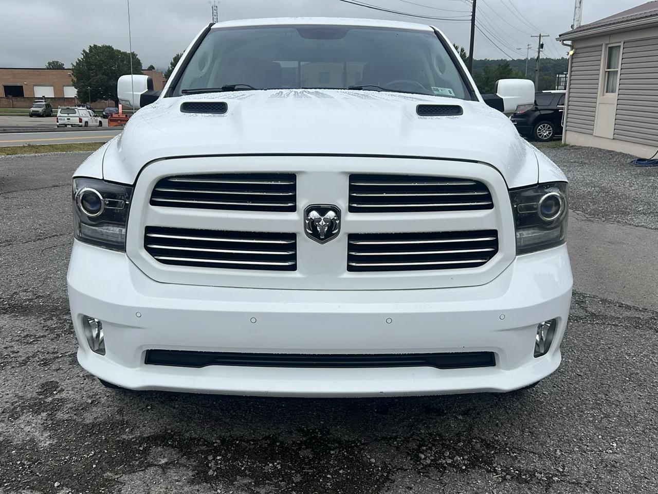 RAM 1500 4WD Crew Cab 140.5" Sport 2014