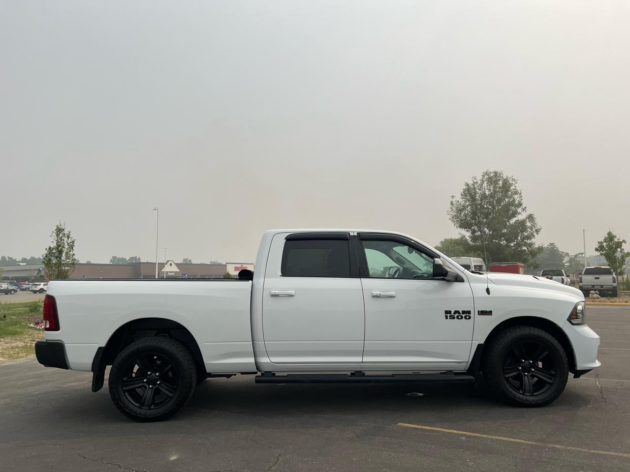 RAM 1500 4WD Crew Cab 149" Sport 2017