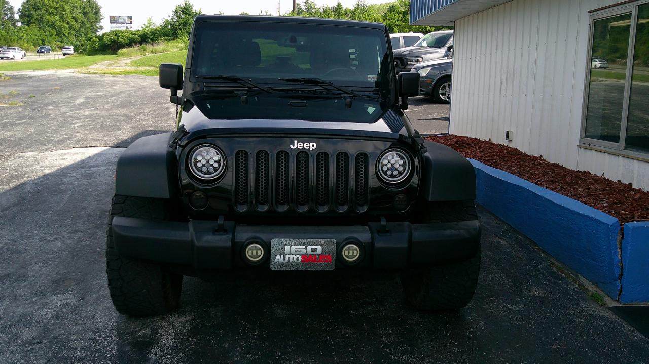 Jeep Wrangler Unlimited 4WD 4dr Sport 2013