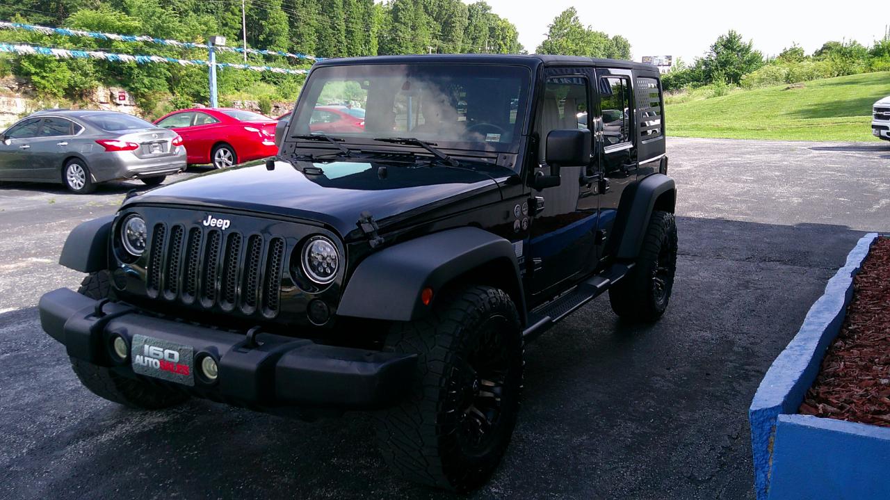 Jeep Wrangler Unlimited 4WD 4dr Sport 2013