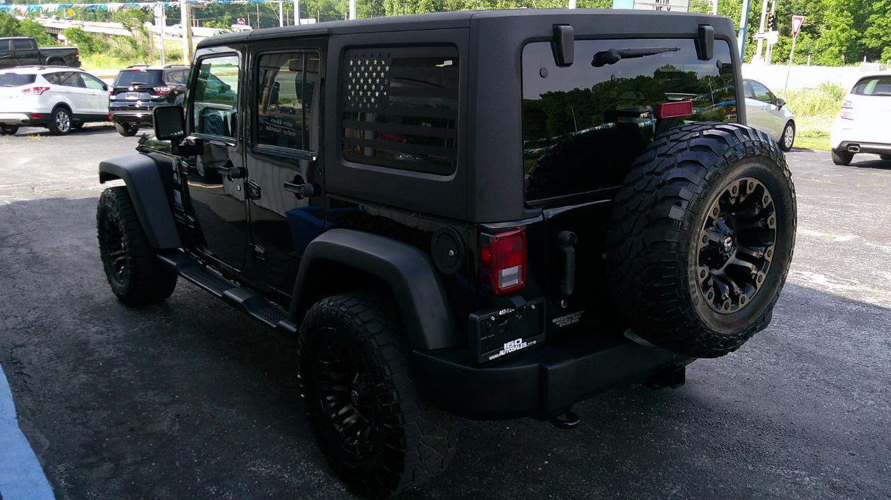 Jeep Wrangler Unlimited 4WD 4dr Sport 2013