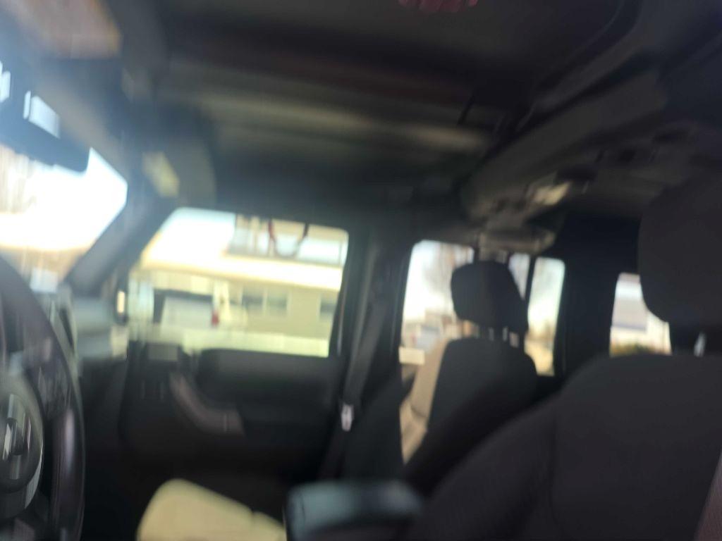 Jeep Wrangler Unlimited 4WD 4dr Sport 2013