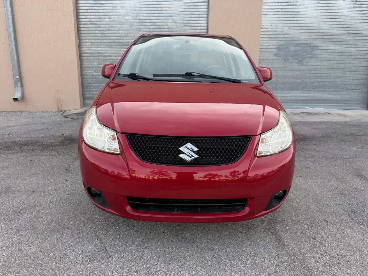 Suzuki SX4 4dr Sdn Man LE FWD 2012