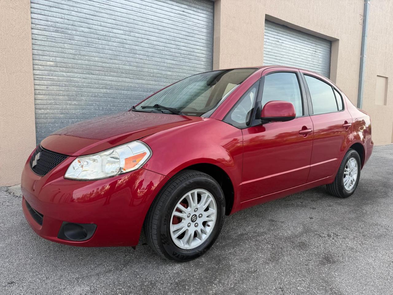 Suzuki SX4 4dr Sdn Man LE FWD 2012
