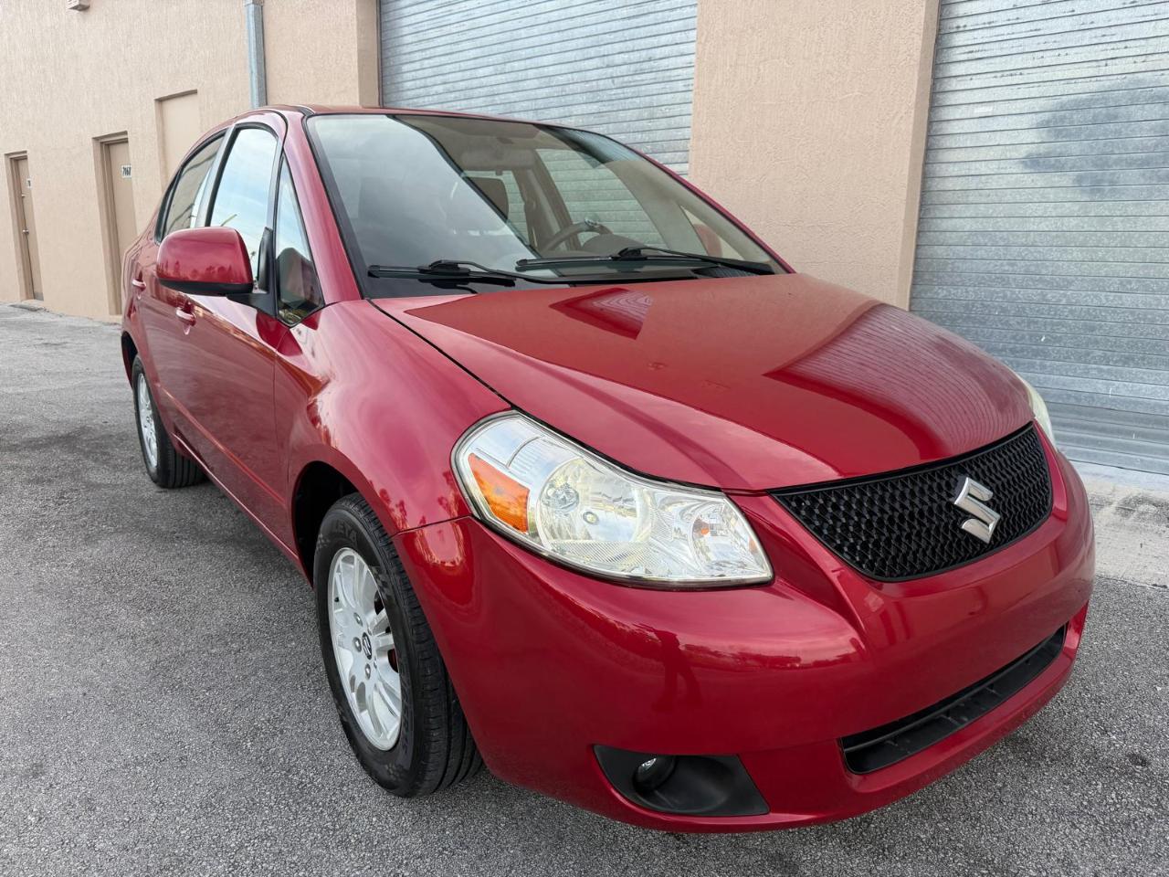 Suzuki SX4 4dr Sdn Man LE FWD 2012