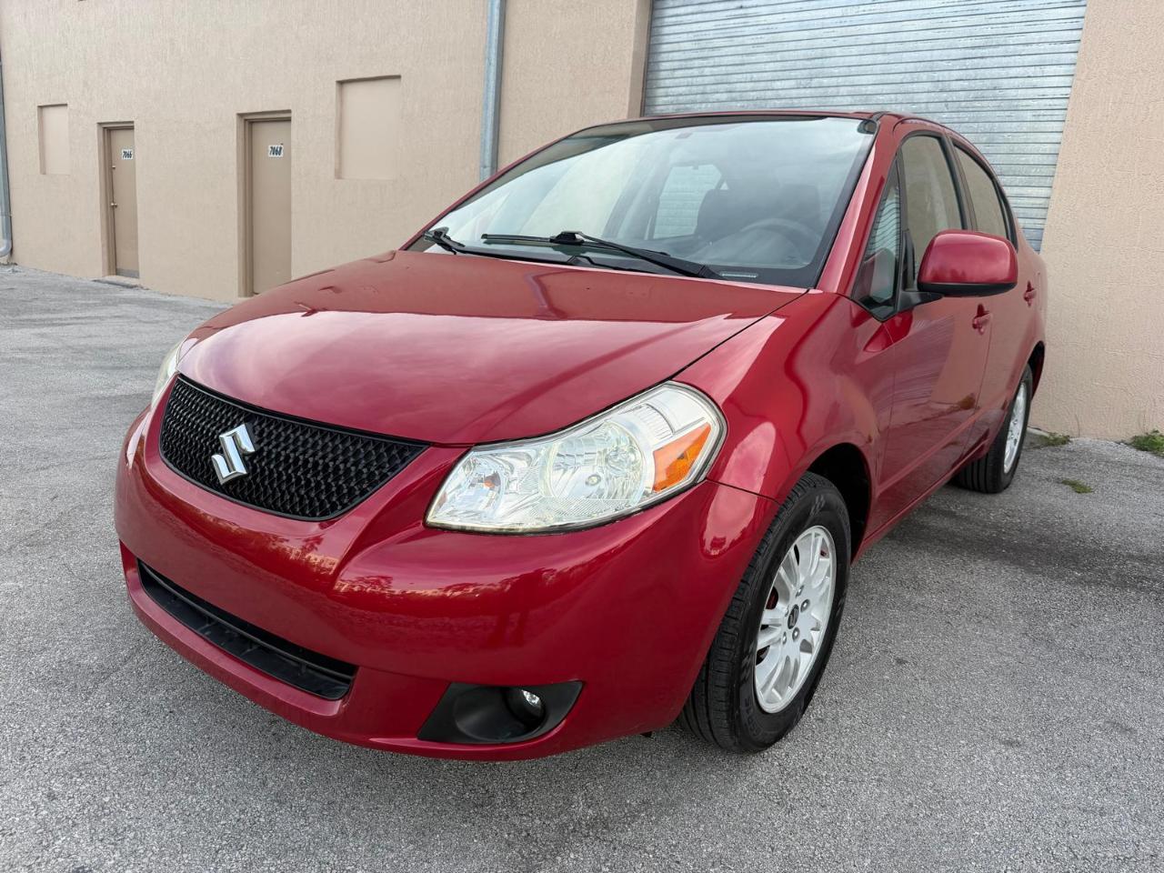 Suzuki SX4 4dr Sdn Man LE FWD 2012