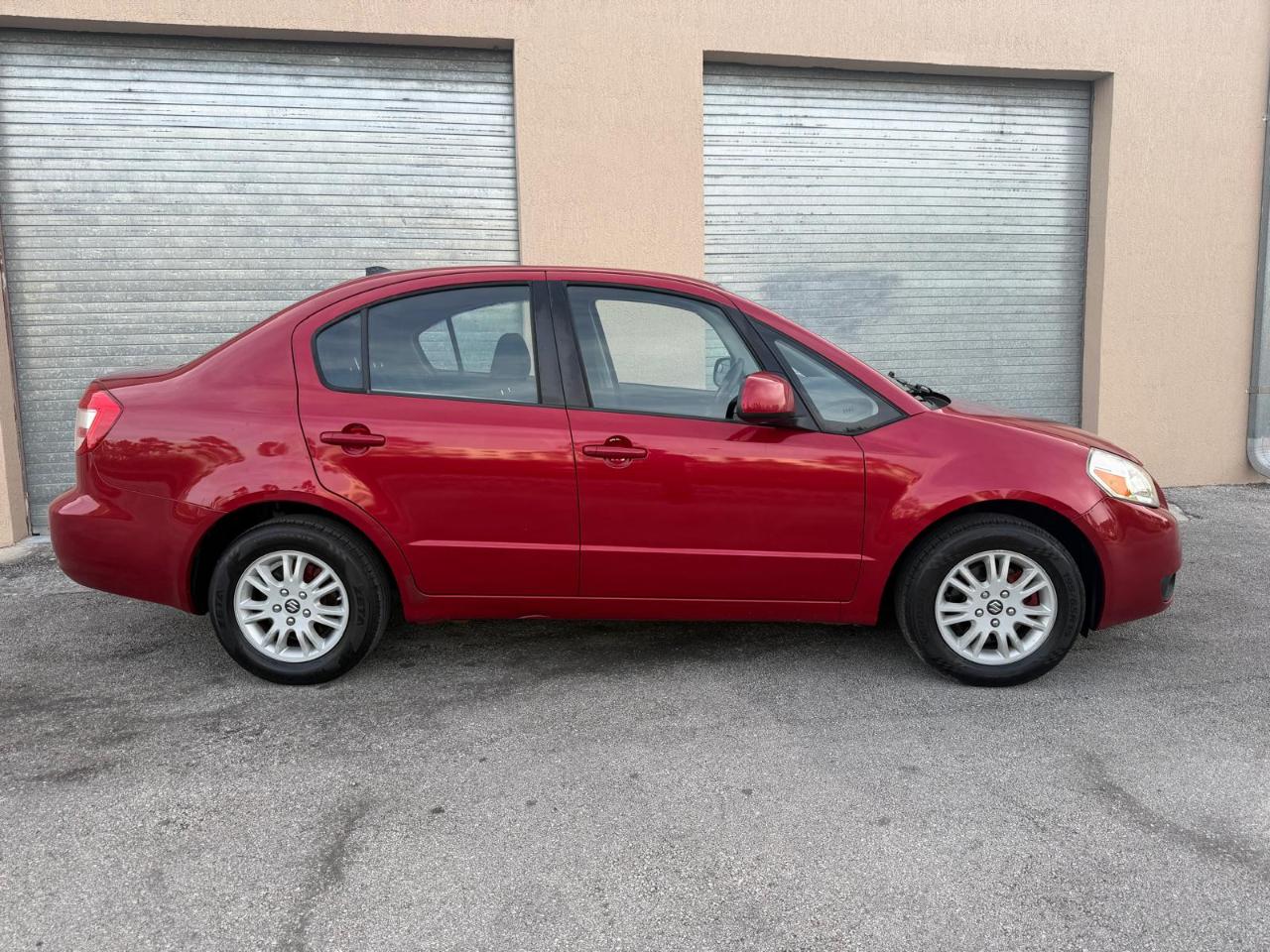 Suzuki SX4 4dr Sdn Man LE FWD 2012