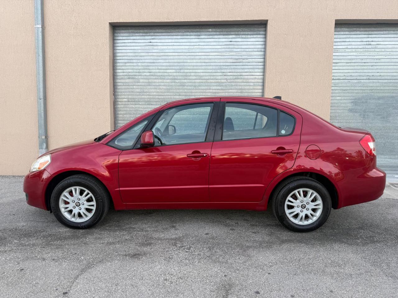 Suzuki SX4 4dr Sdn Man LE FWD 2012