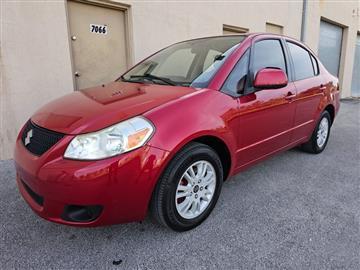 2012 Suzuki SX4 4dr Sdn Man LE FWD
