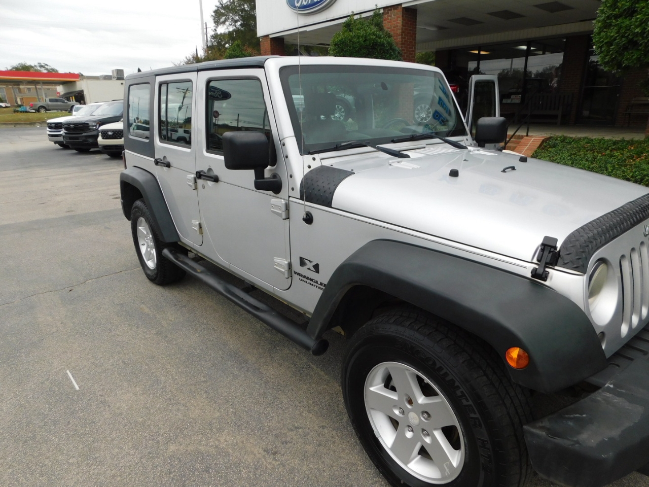 Used 2009 Jeep Wrangler Unlimited X with VIN 1J4GA39179L774079 for sale in Hawkinsville, GA