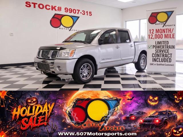 Silver 2006 Nissan Titan Pickup Truck Four-Wheel Drive Automatic
