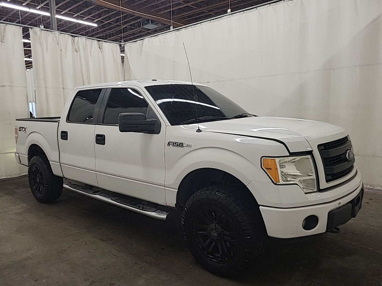 Ford F-150 4WD SuperCrew 145" STX 2014