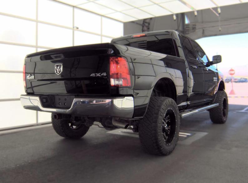 RAM 1500 4WD Quad Cab 140.5" Outdoorsman 2015