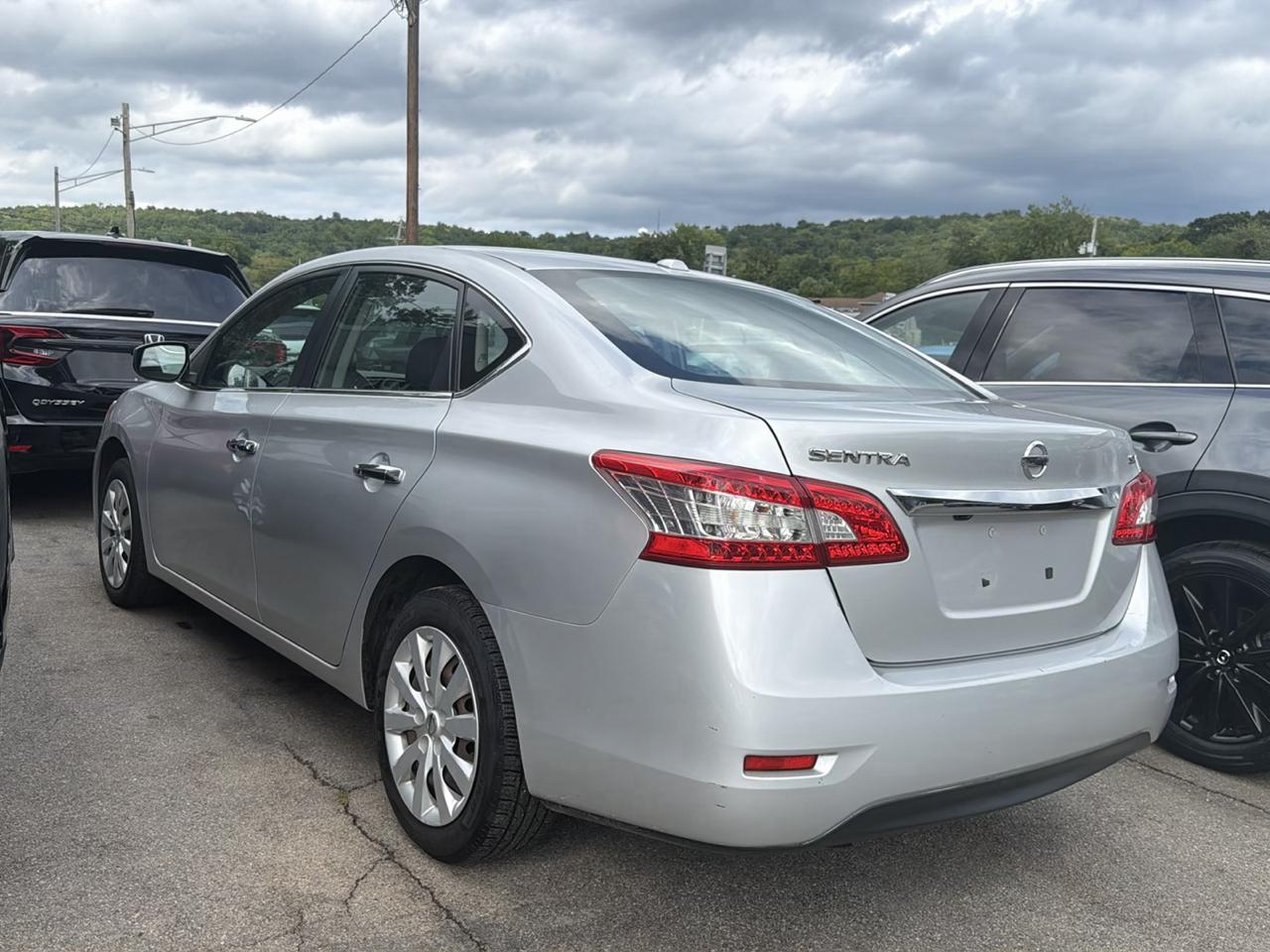 Nissan Sentra 4dr Sdn I4 CVT FE+ S 2015