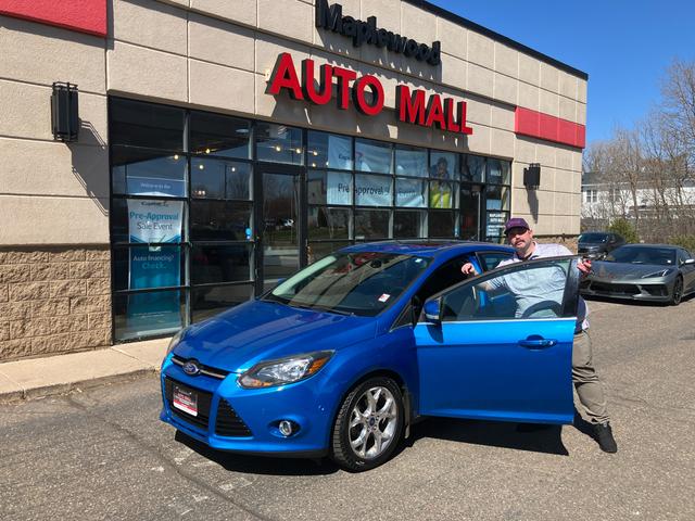 Blue 2012 Ford Focus Titanium Hatchback Hatchback Front-Wheel Drive Automatic