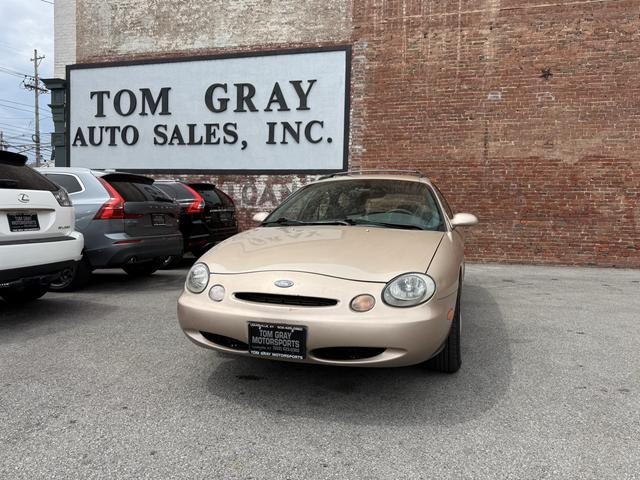Gold 1996 Ford Taurus Sedan Front-Wheel Drive Automatic