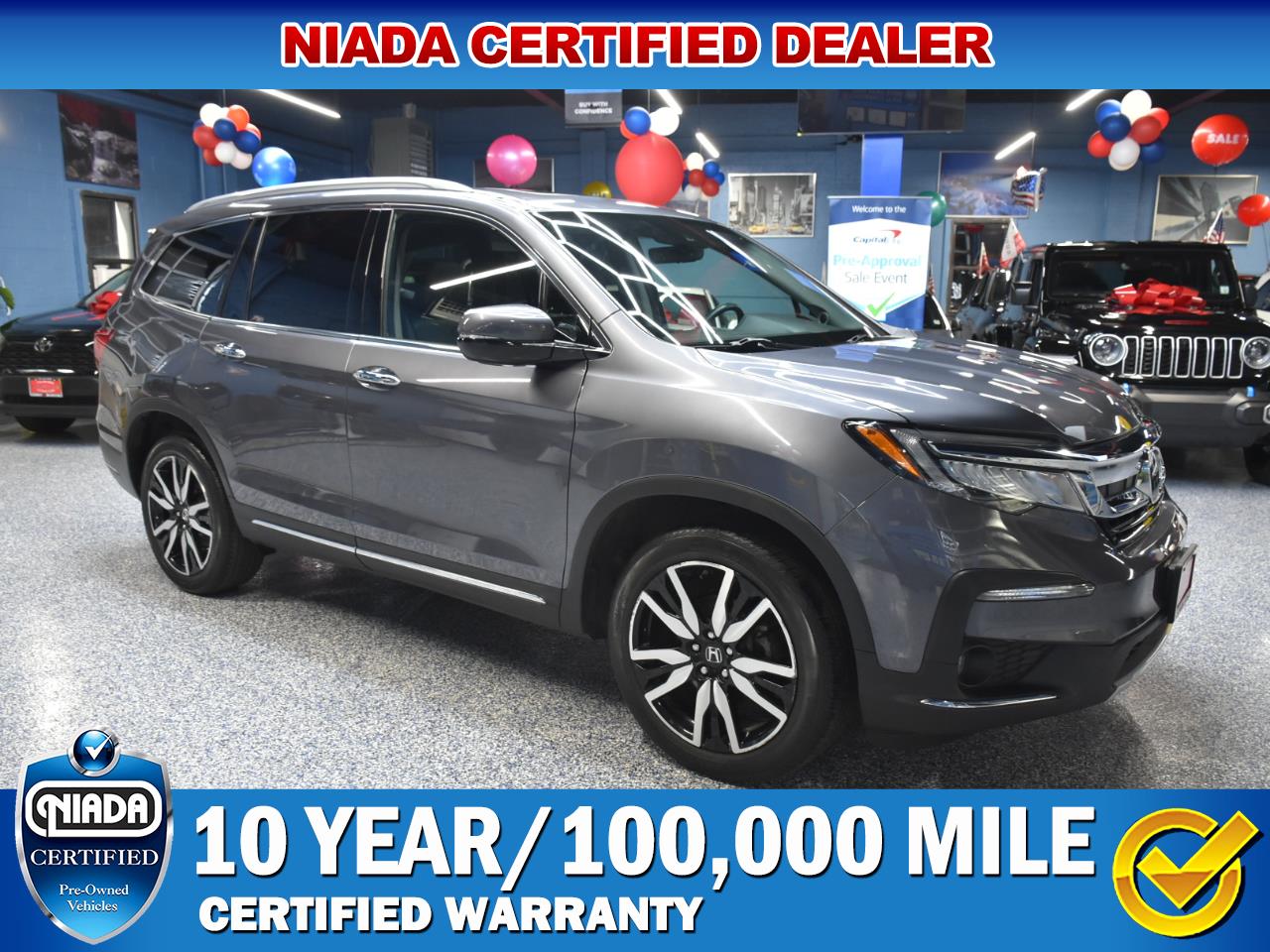 2022 Honda Pilot Touring AWD w/Rear Captains Chairs