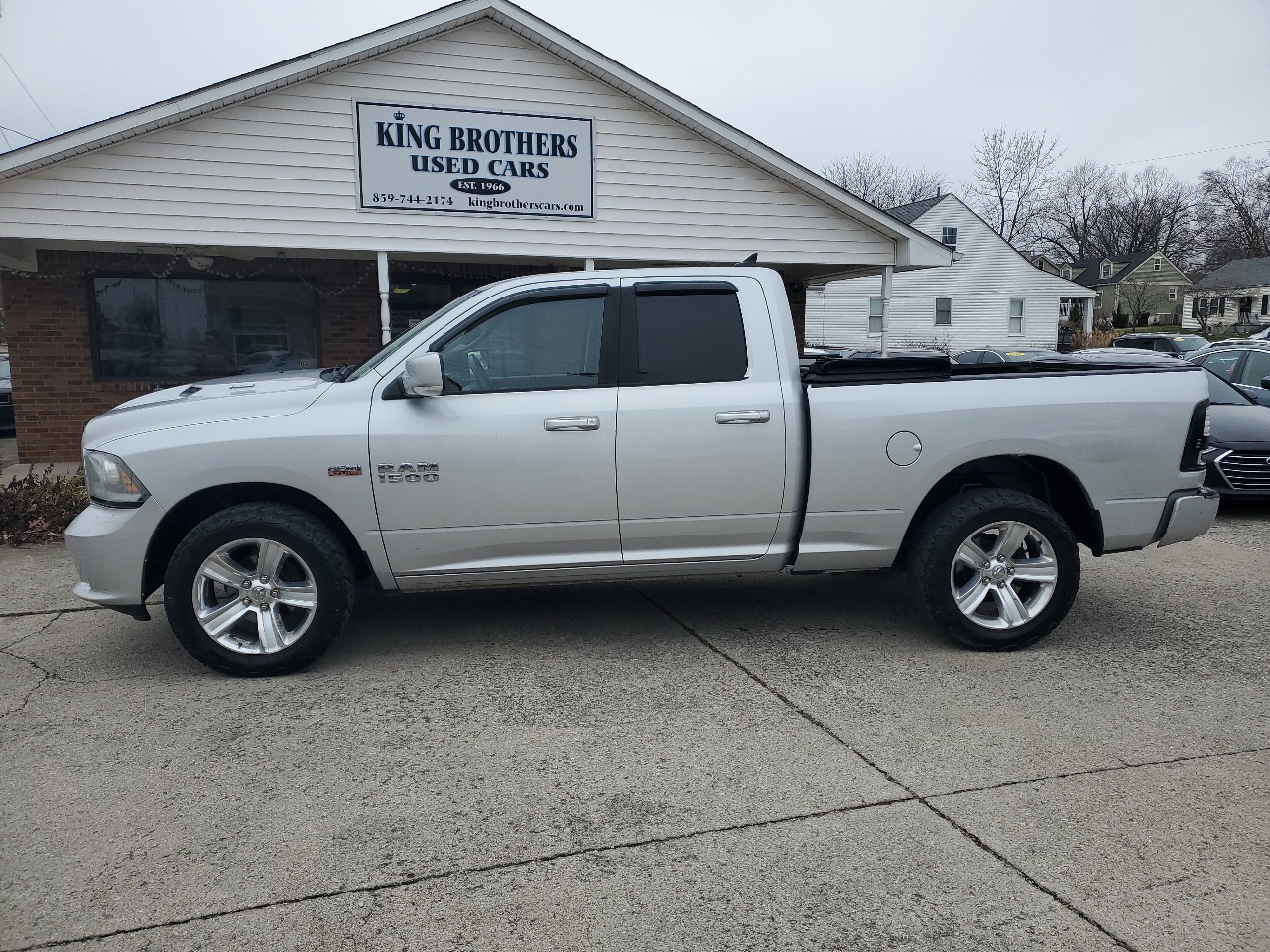 RAM 1500 4WD Quad Cab 140.5" Sport 2014