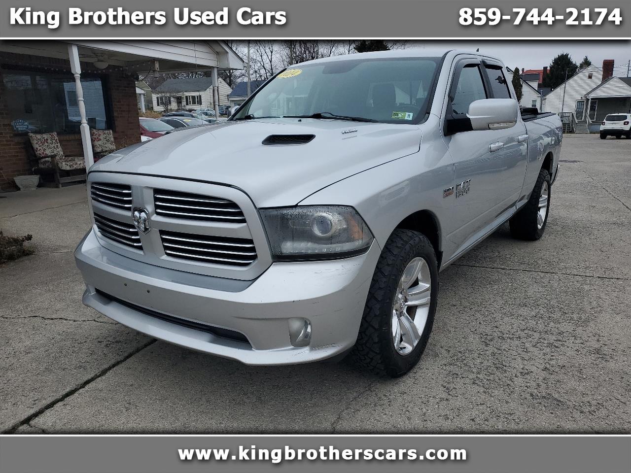 RAM 1500 4WD Quad Cab 140.5" Sport 2014