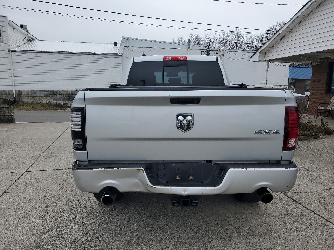 RAM 1500 4WD Quad Cab 140.5" Sport 2014