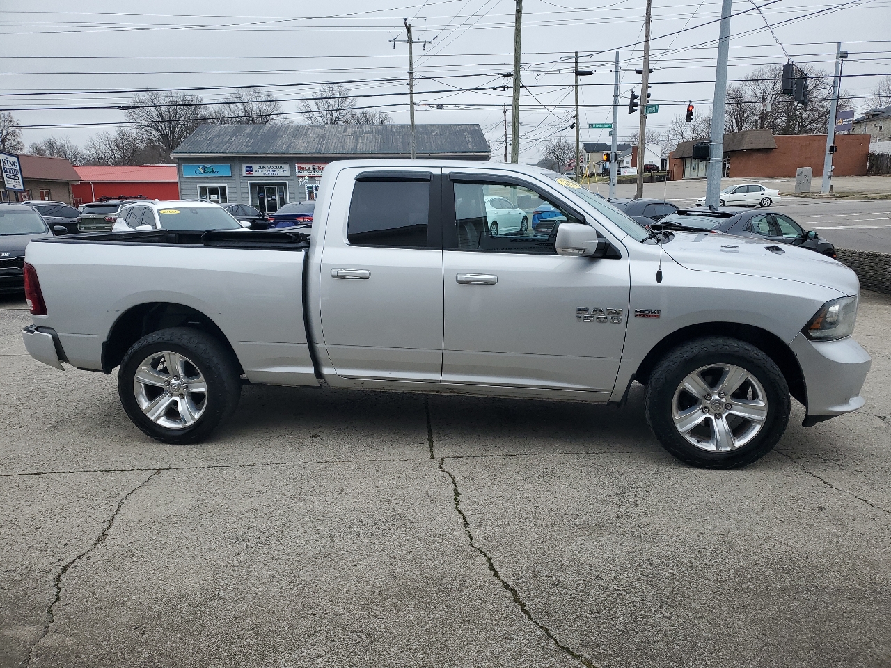 RAM 1500 4WD Quad Cab 140.5" Sport 2014