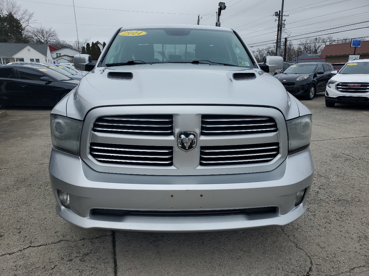 RAM 1500 4WD Quad Cab 140.5" Sport 2014