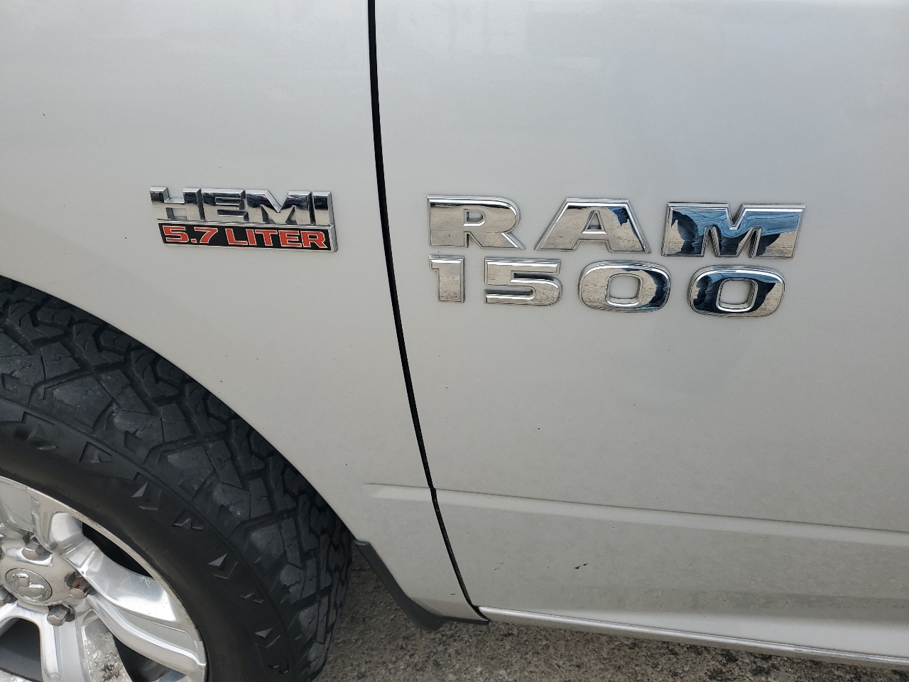 RAM 1500 4WD Quad Cab 140.5" Sport 2014