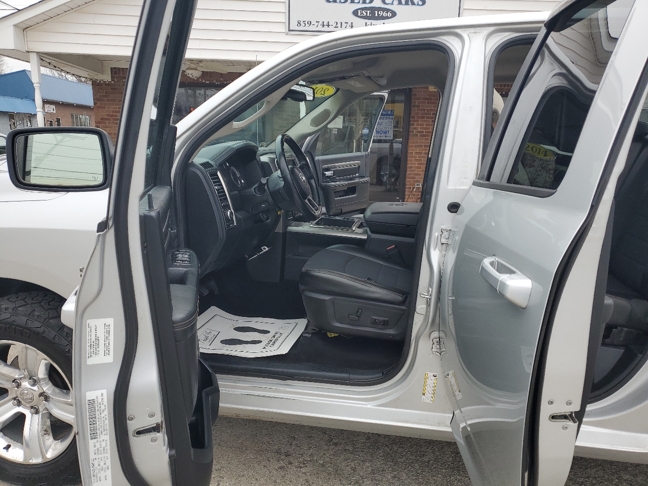 RAM 1500 4WD Quad Cab 140.5" Sport 2014