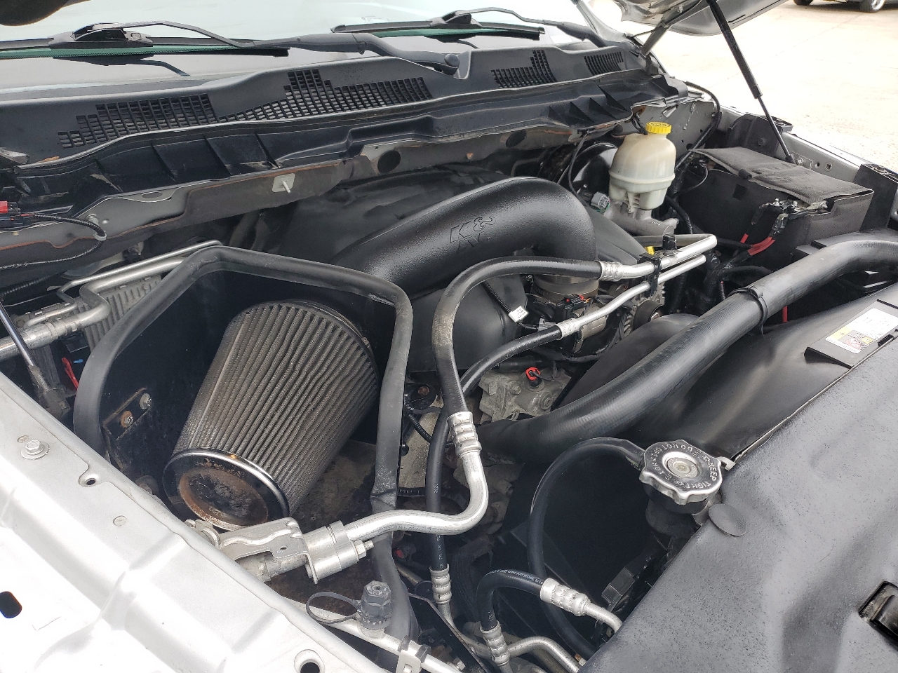 RAM 1500 4WD Quad Cab 140.5" Sport 2014