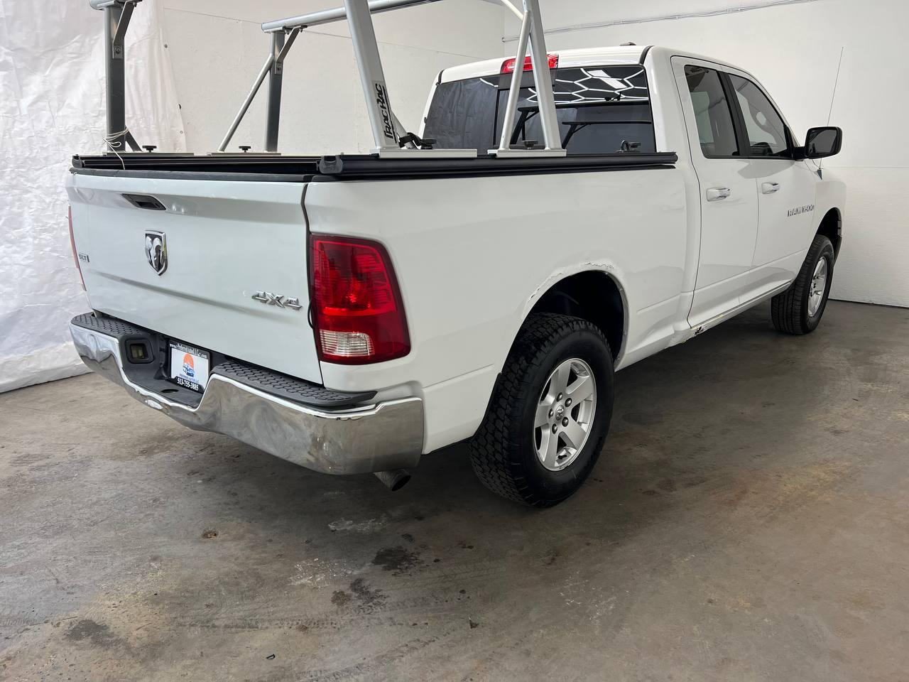 RAM 1500 4WD Quad Cab 140.5" SLT 2012