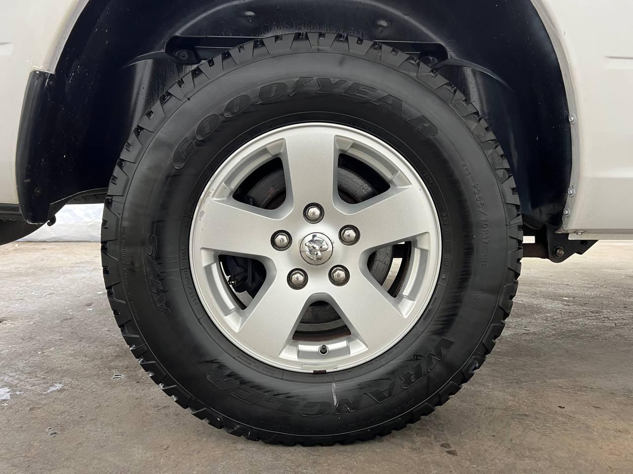 RAM 1500 4WD Quad Cab 140.5" SLT 2012