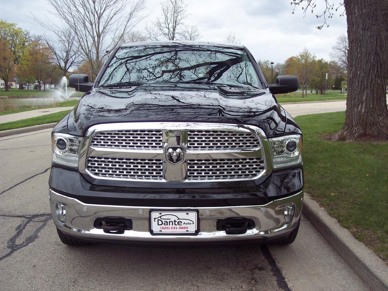 RAM 1500 4WD Quad Cab 140.5" Laramie 2014