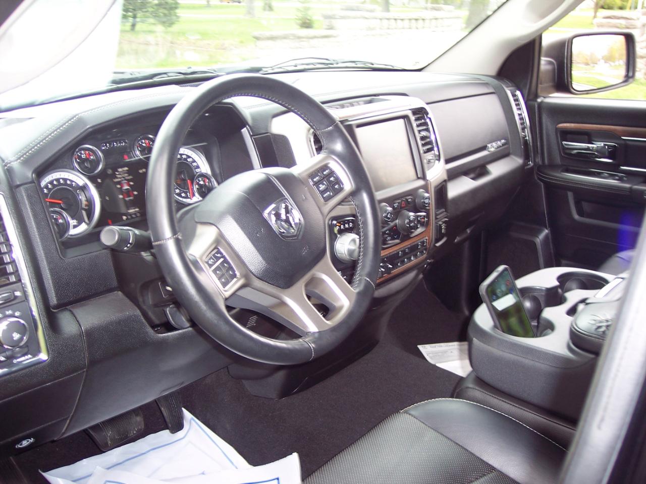 RAM 1500 4WD Quad Cab 140.5" Laramie 2014