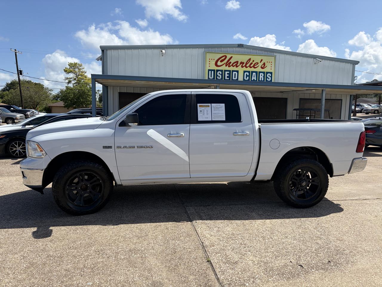 RAM 1500 4WD Crew Cab 140.5" SLT 2012