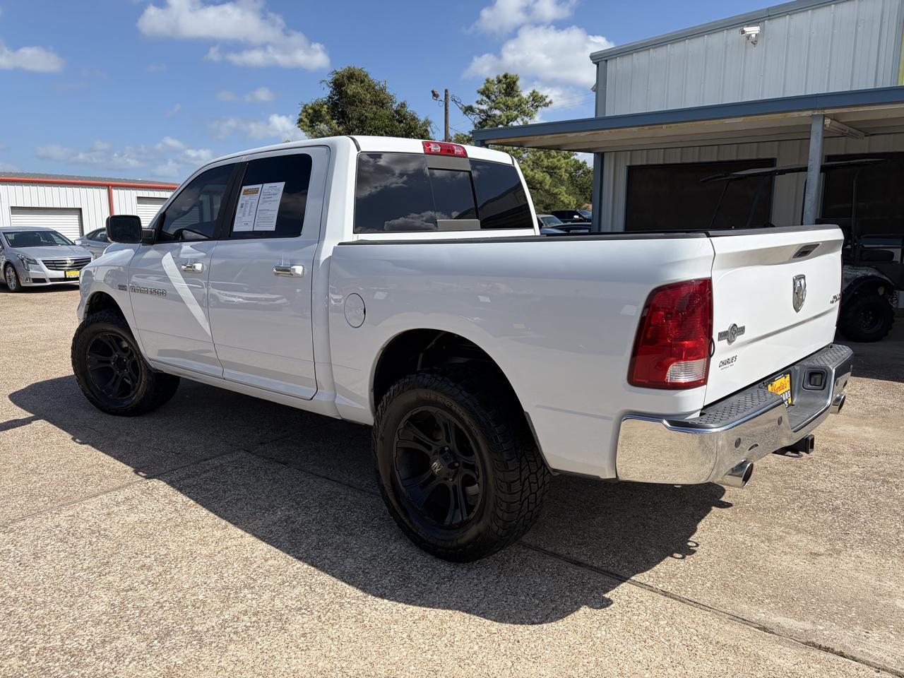 RAM 1500 4WD Crew Cab 140.5" SLT 2012