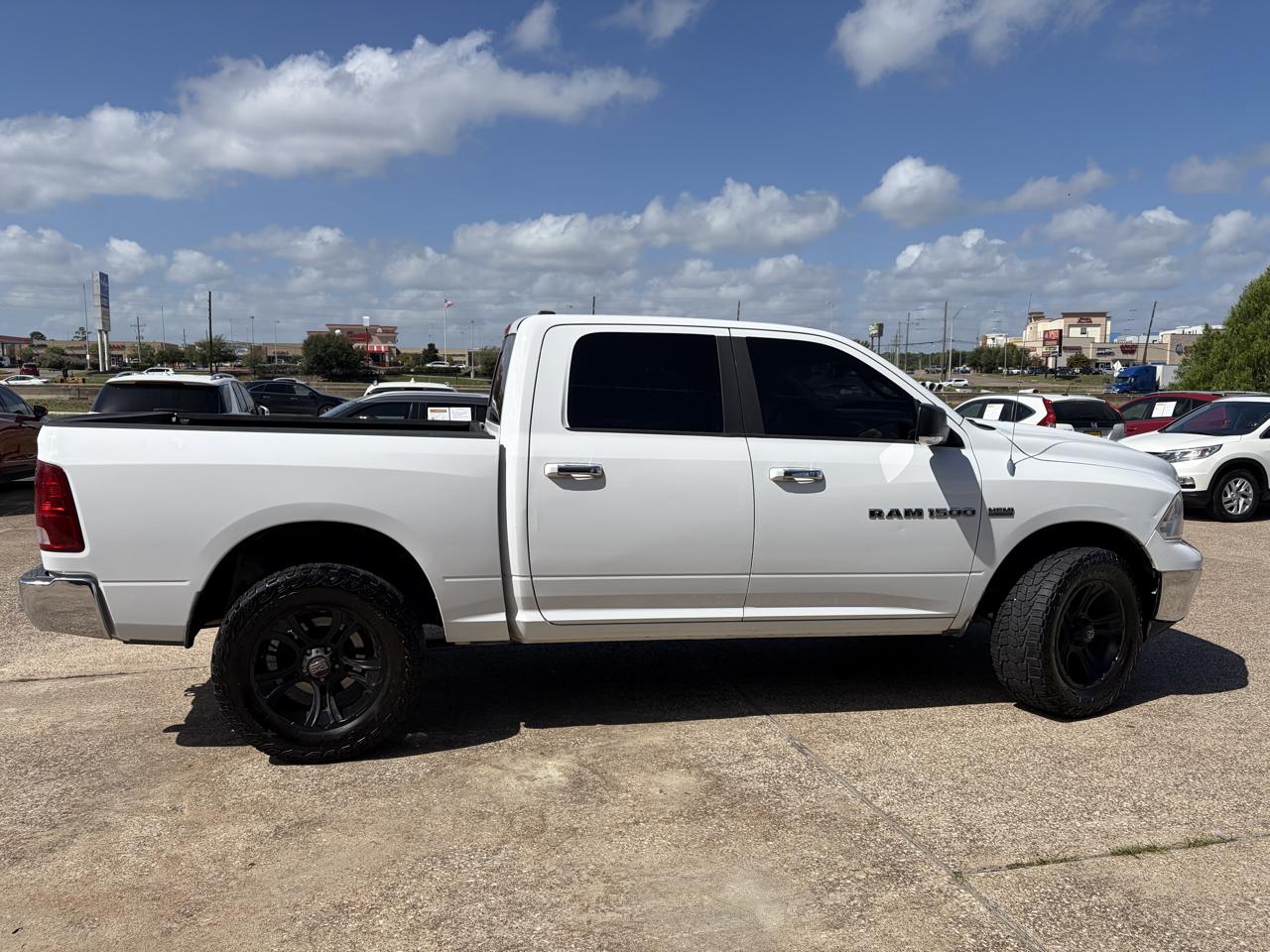 RAM 1500 4WD Crew Cab 140.5" SLT 2012