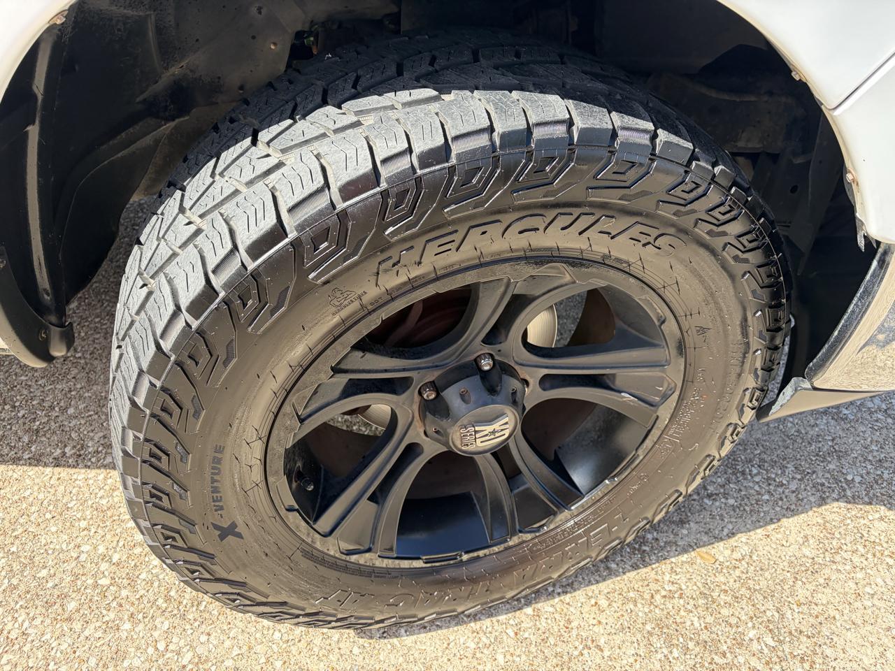 RAM 1500 4WD Crew Cab 140.5" SLT 2012