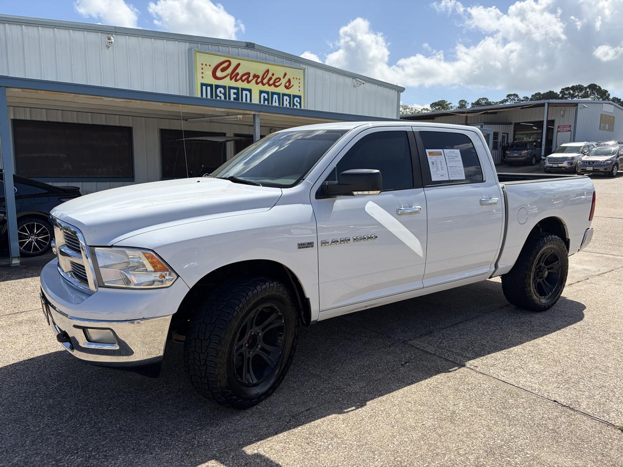 RAM 1500 4WD Crew Cab 140.5" SLT 2012