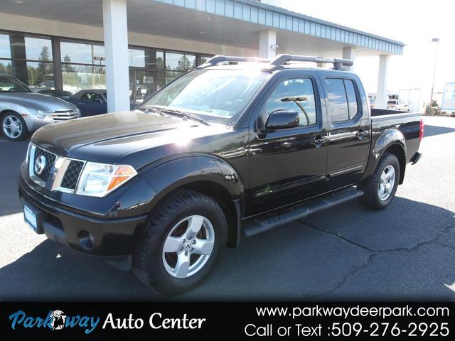 Black 2007 Nissan Frontier LE Crew Cab 4WD Pickup Truck Four-Wheel Drive Automatic