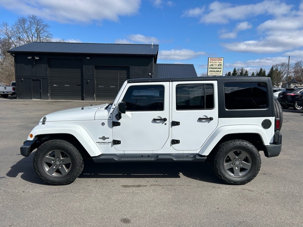 Jeep Wrangler Unlimited 4WD 4dr Freedom Edition *Ltd Avail* 2015 Jeep Wrangler Unlimited 4WD 4dr Freedom Edition *Ltd Avail* 2015
