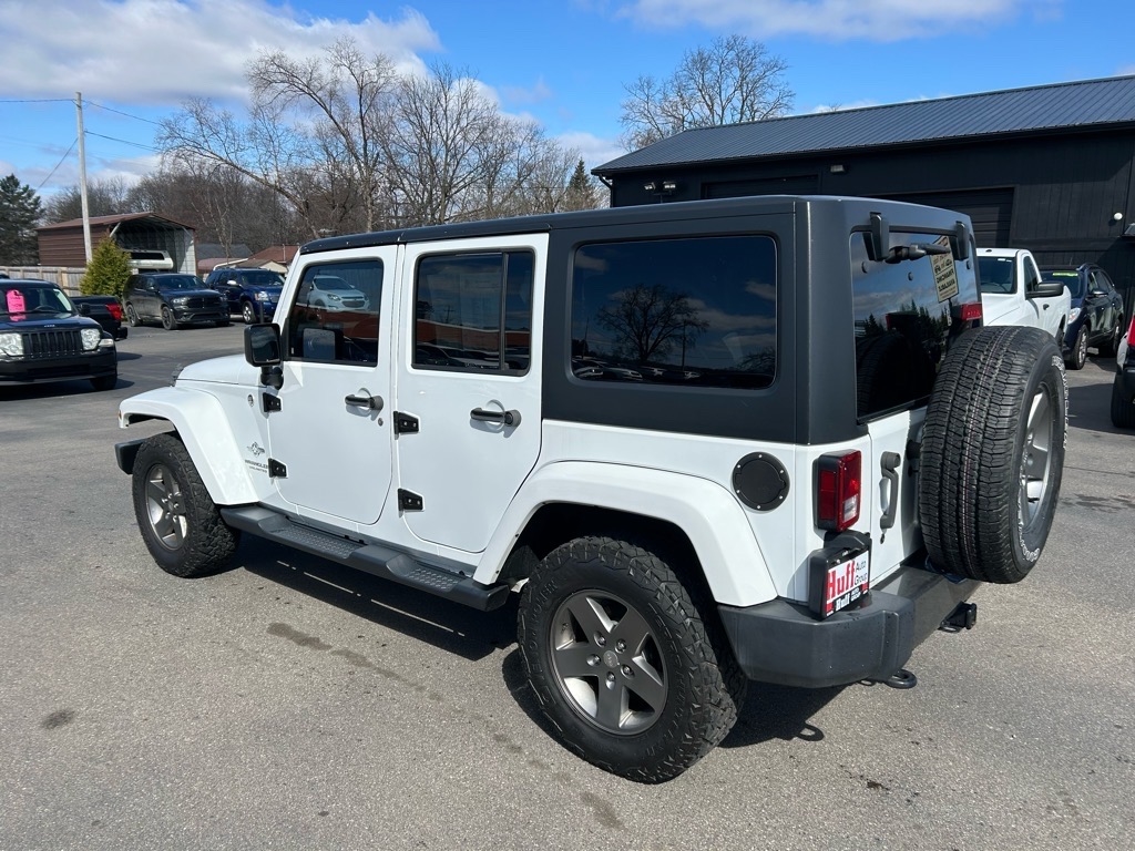 Jeep Wrangler Unlimited 4WD 4dr Freedom Edition *Ltd Avail* 2015 Jeep Wrangler Unlimited 4WD 4dr Freedom Edition *Ltd Avail* 2015