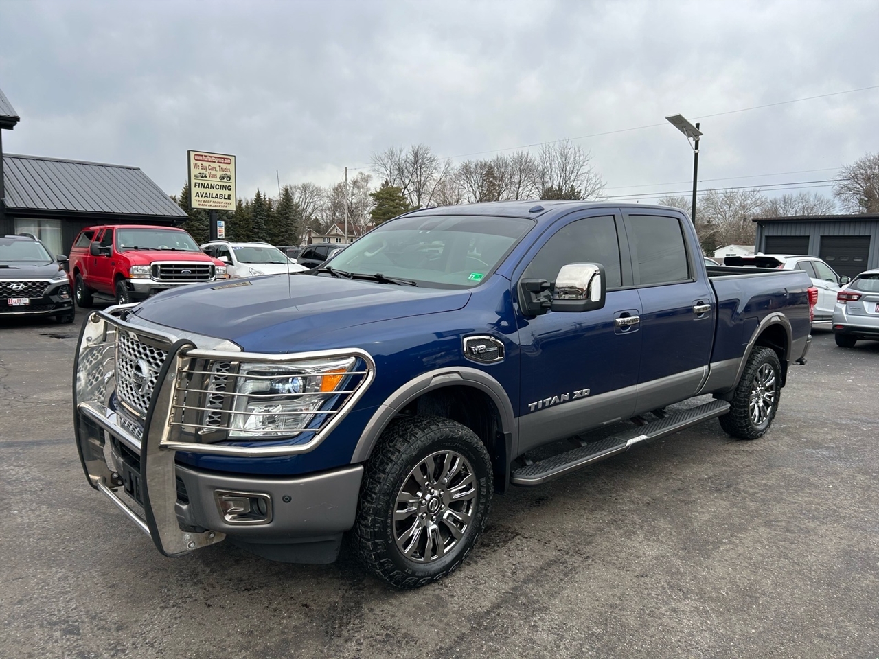 Nissan Titan XD 4x4 Gas Crew Cab Platinum Reserve 2017