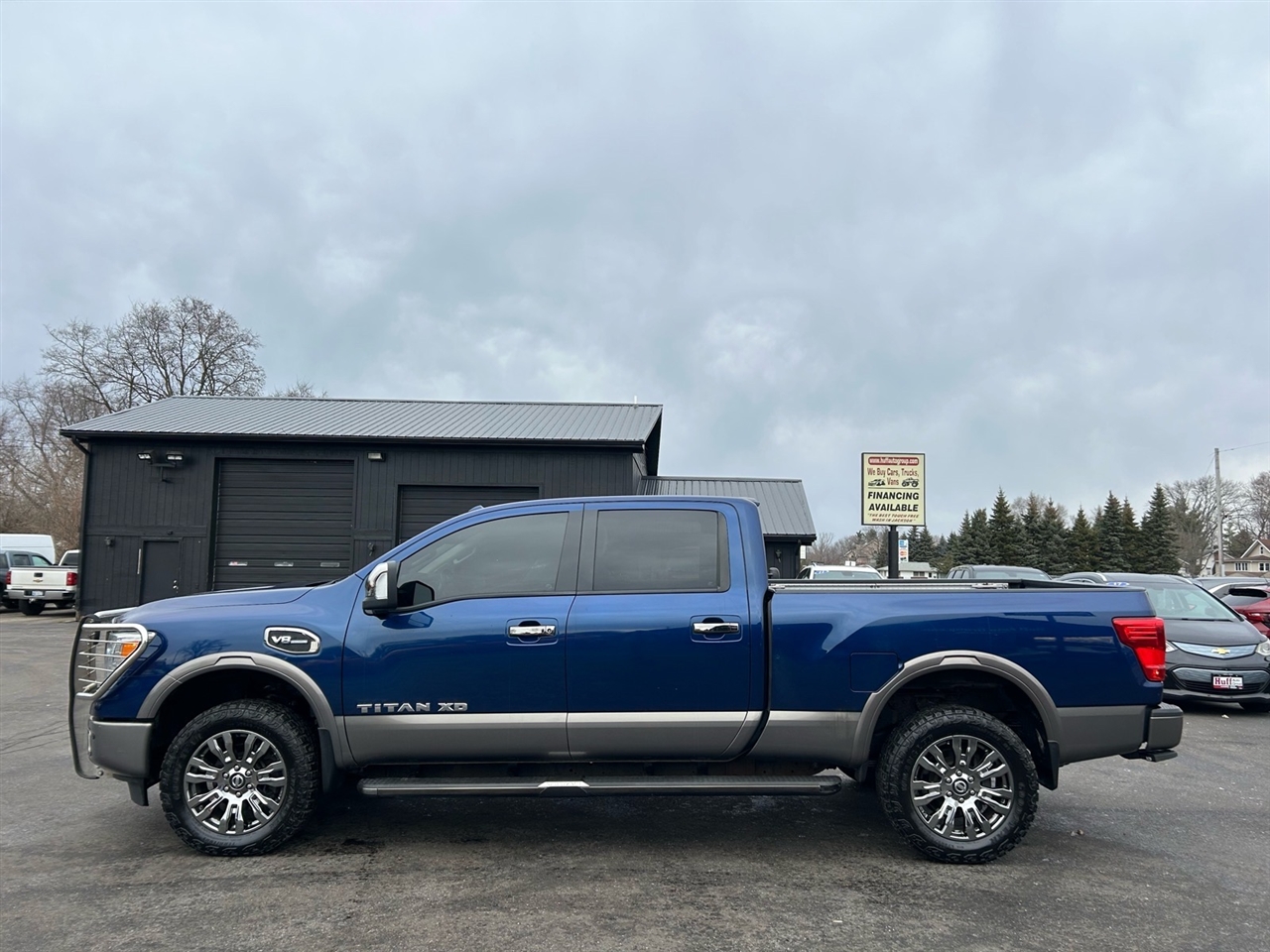 Nissan Titan XD 4x4 Gas Crew Cab Platinum Reserve 2017
