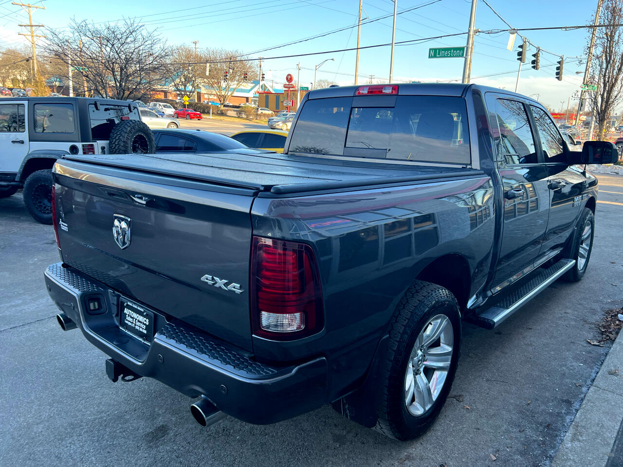 RAM 1500 4WD Crew Cab 140.5" Sport 2014