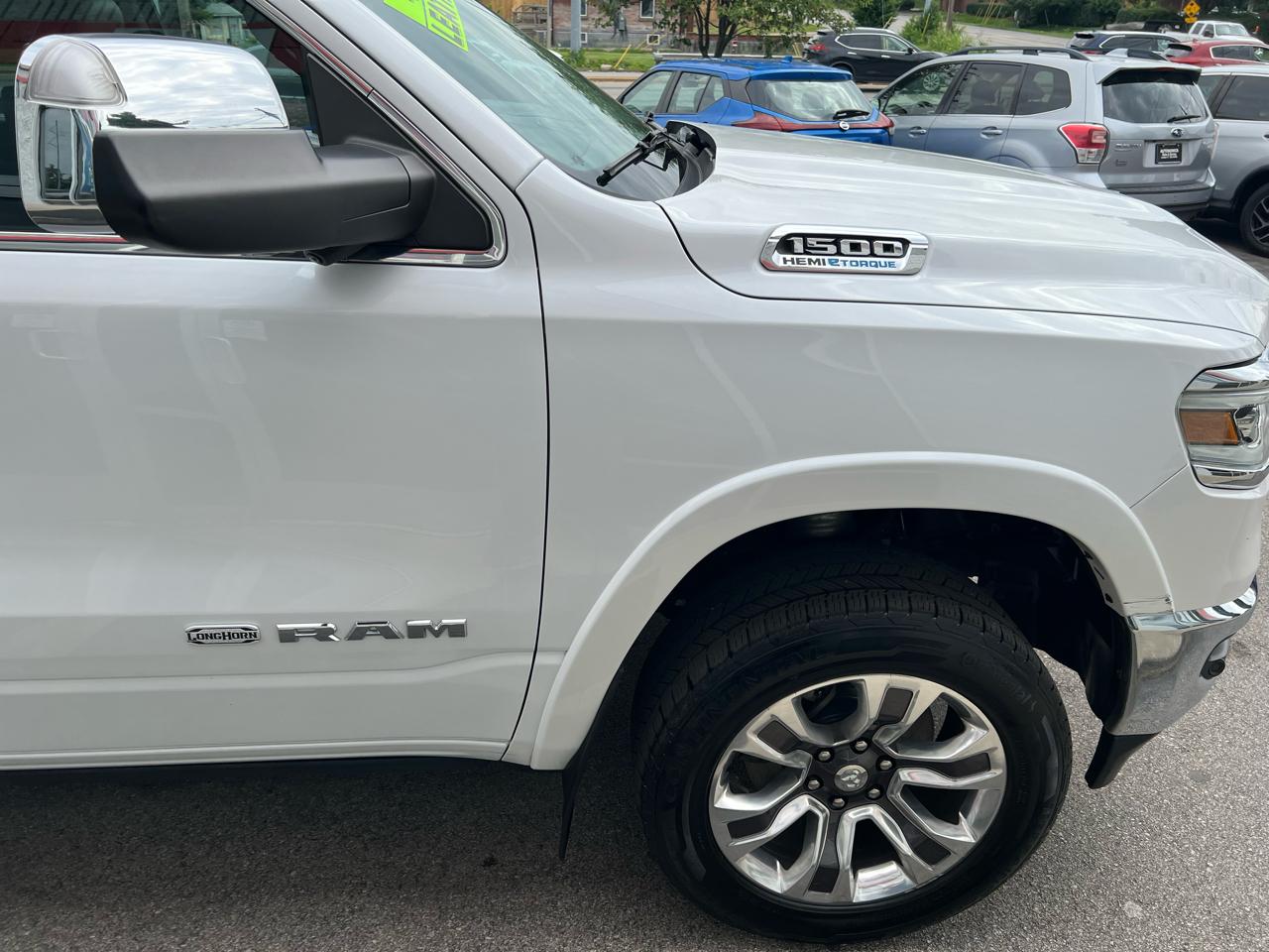 RAM 1500 4WD Crew Cab 140.5" Laramie Longhorn Edition 2021