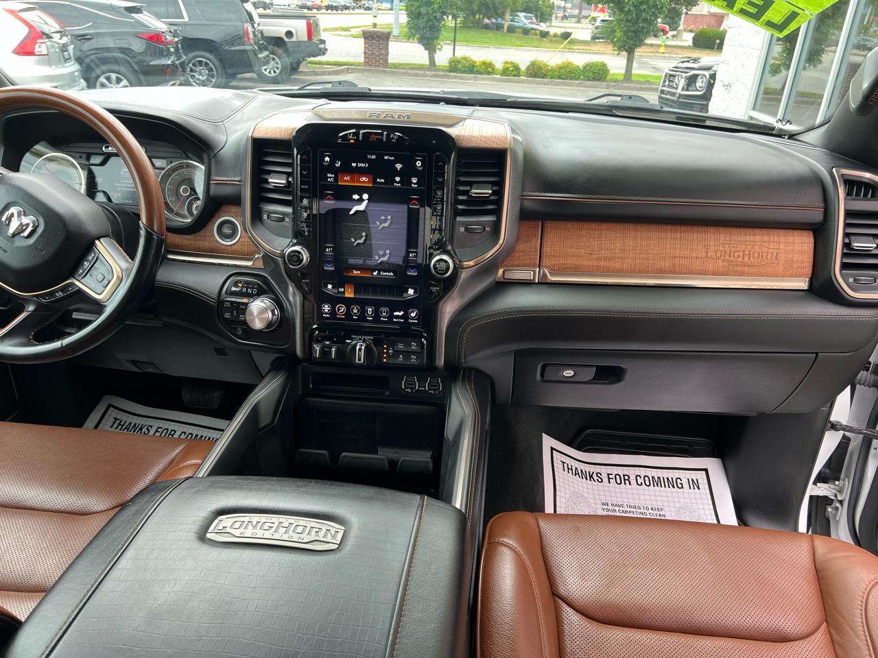RAM 1500 4WD Crew Cab 140.5" Laramie Longhorn Edition 2021